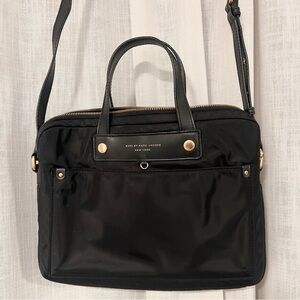 Marc Jocobs computer/work bag in black and gold detail.